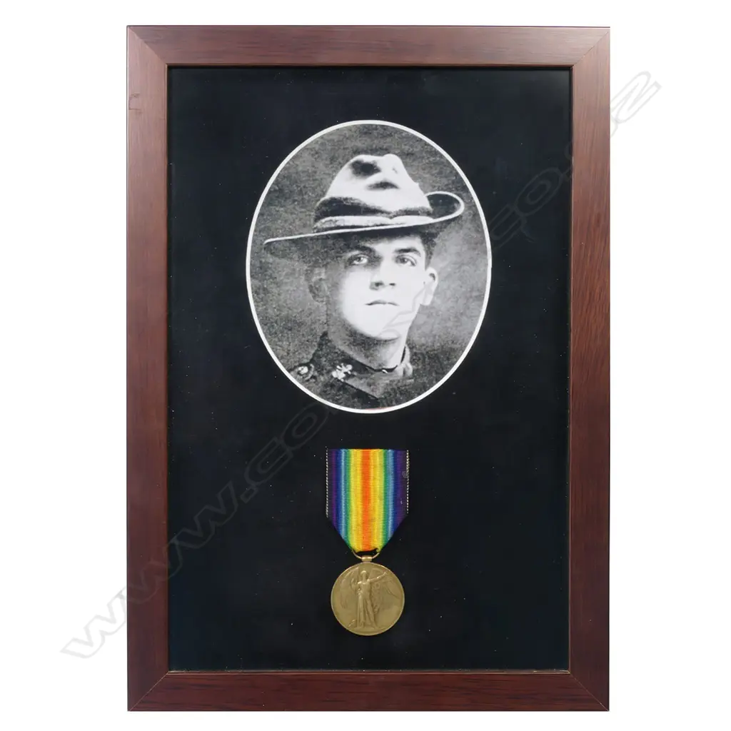 1914-19 Victory Medal in modern frame with copy photo - the medal impressed 10/273 PTE H E M BROOME NZEF. Harry Broome from Whanganui was a young lawyer serving in the Wellington West Coast Company of the Wellington Infantry. He was killed at Helles on 10 May 1915 aged 20. Image 1++