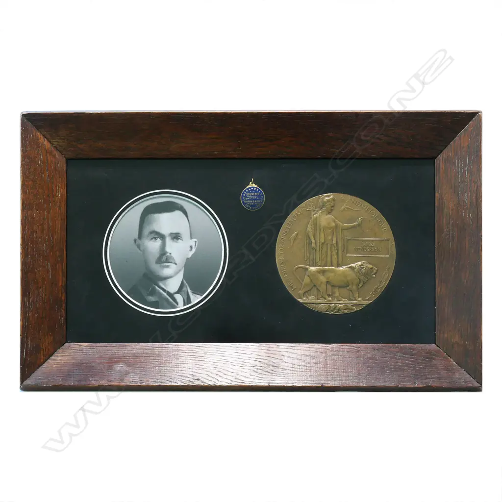The historic WW1 Memorial Plaque named to JAMES HENDERSON - in modern frame with copy photo. Presumed to be 13/277 Lieutenant James Henderson from Kihikihi was a single farmer who served with the Waikato Mounted Rifles at Gallipoli and was killed at Chunuk Bair on 8 August 1915. Image 1++