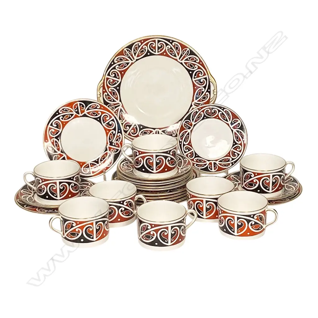 A Royal Doulton 'Māori Art' eight-person porcelain tea service - comprising eight coffee cups, eight saucers, eight side plates and one cake plate. Decorated in a Māori kowhaiwhai rafter design adapted by Augustus Hamilton for Royal Doulton. Image 1++