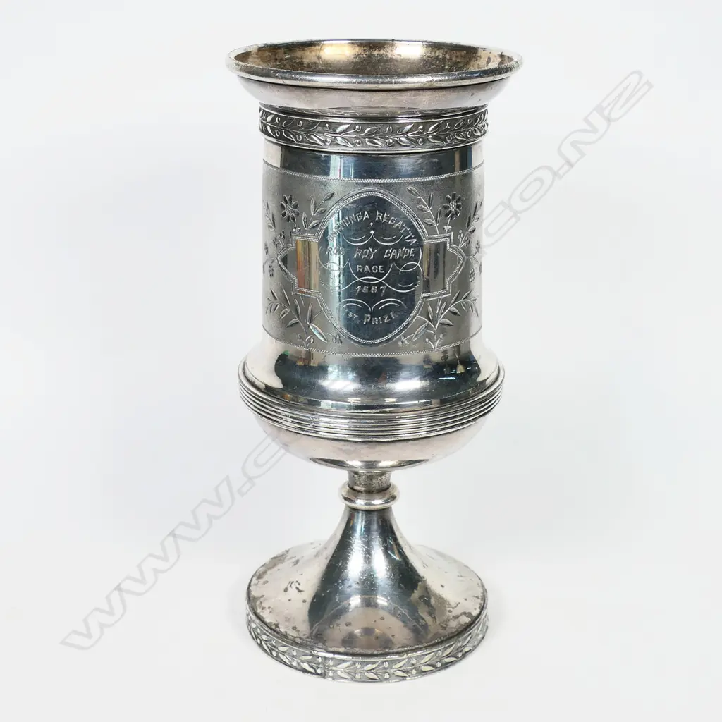 The Onehunga Regatta 1887 silver plate trophy cup - by Simpson, Hall, Miller & Co (Wallingford, Connecticut, USA). Dia.97mm. H.210mm. Image 1++