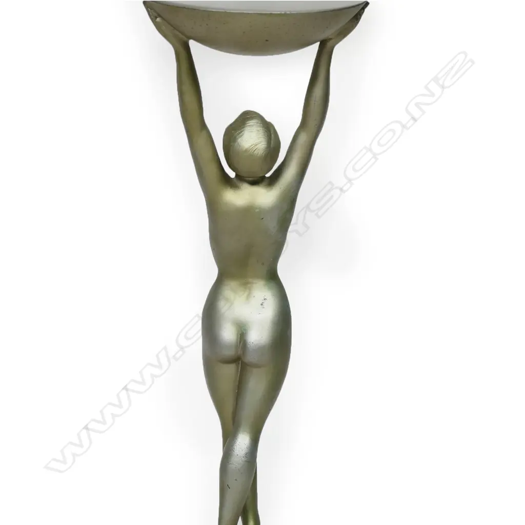 An Art Deco cold-painted silvered spelter nude figured table lamp, by Jacques Limousin, c.1930s - the athletic figure holds a white glass spherical shade above her head, signed to the base 'Limousin', raised on alabaster plinth. Overall H.600mm. some small losses to Image 1++