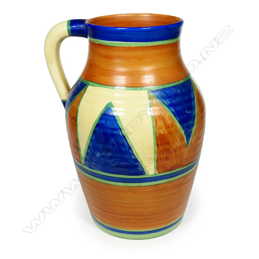 Clarice Cliff original Bizarre large Lotus jug - with a broad band of painted diamond design. Black printed marks to base. C.1929. Hairline crack to the top rim. H.290mm. Image 1++