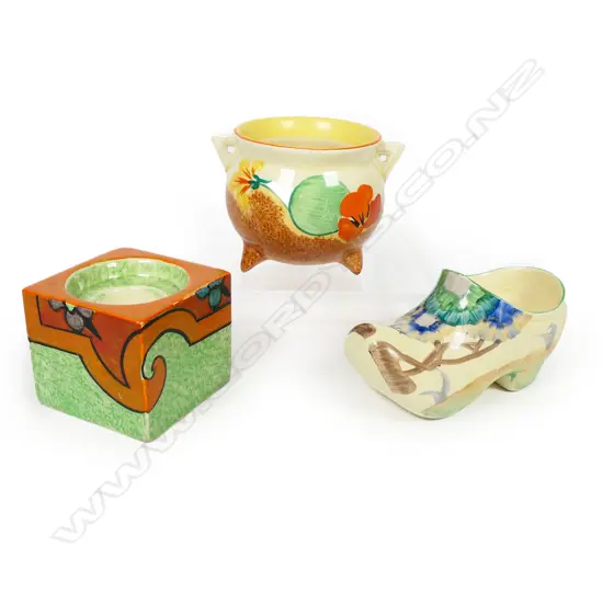 Three Clarice Cliff Bizarre pieces - cube inkwell (no lid), Rodanthe pattern clog or sabot in the Viscaria colourway L.105mm. Together with a Nasturtium pattern cauldron H.73mm.