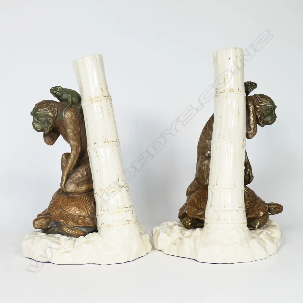 A pair of Victorian Royal Worcester figural stem vases - modelled as a turtle balancing a monkey and frog on its shell, beside a bamboo formed vase, on a rock formation, impressed factory stamp to base. Printed and impressed marks 1872 H.230mm. Image 1++