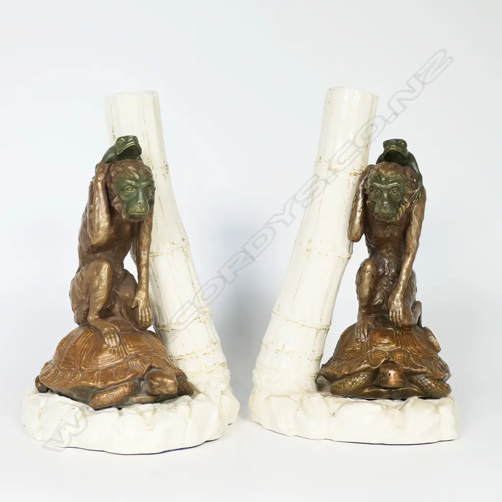 A pair of Victorian Royal Worcester figural stem vases - modelled as a turtle balancing a monkey and frog on its shell, beside a bamboo formed vase, on a rock formation, impressed factory stamp to base. Printed and impressed marks 1872 H.230mm. Image 1++