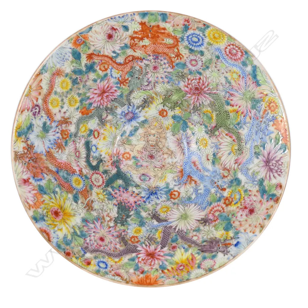 A fine quality Chinese all over floral enamelled dish - flared form, the fine floral (100 flowers) decoration incorporating green and red dragons. Four-character Qianlong mark in kaishu script in blue enamel to the base. Dia.207mm. Purchased Webb's 23.07.23 $9,560. Catalogued as Republic period. Image 1++