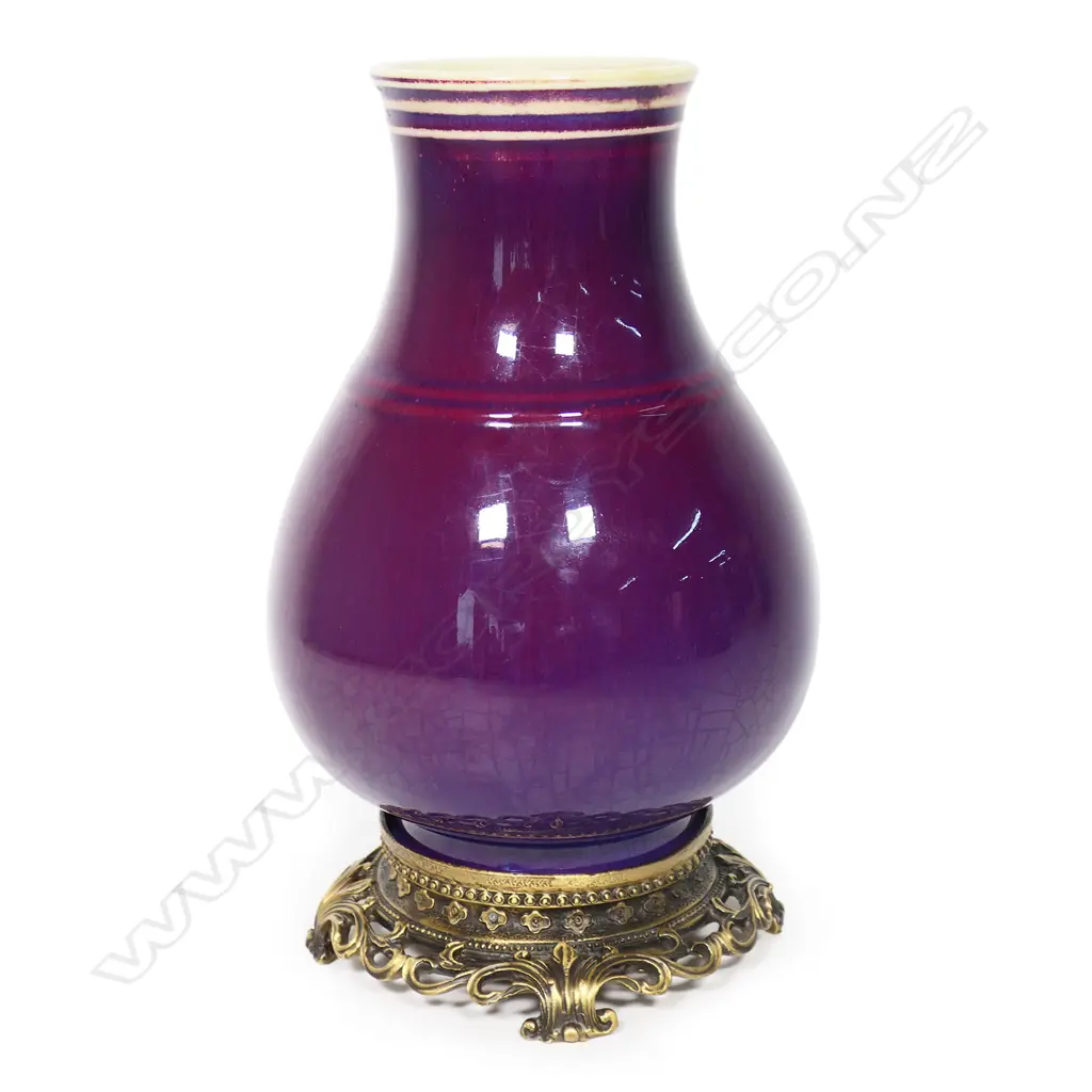 A Chinese hu-form vase with plum-purple glaze, impressed with Yongzheng four-character reign mark and bearing collector's labels. Image 1++