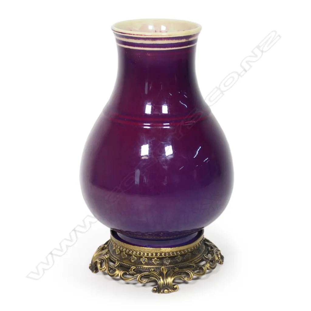 A Chinese hu-form vase with plum-purple glaze, impressed with Yongzheng four-character reign mark and bearing collector's labels. Image 1++
