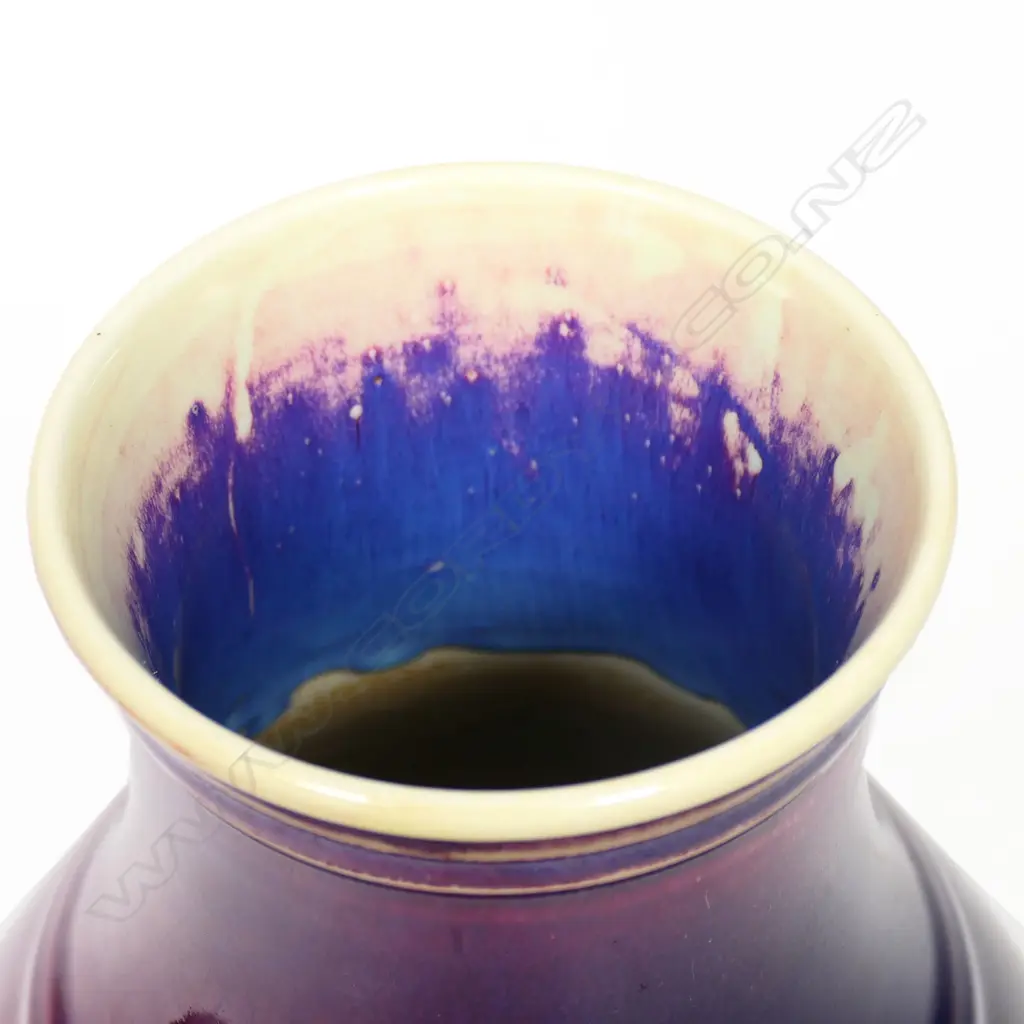 A Chinese hu-form vase with plum-purple glaze, impressed with Yongzheng four-character reign mark and bearing collector's labels. Image 1++