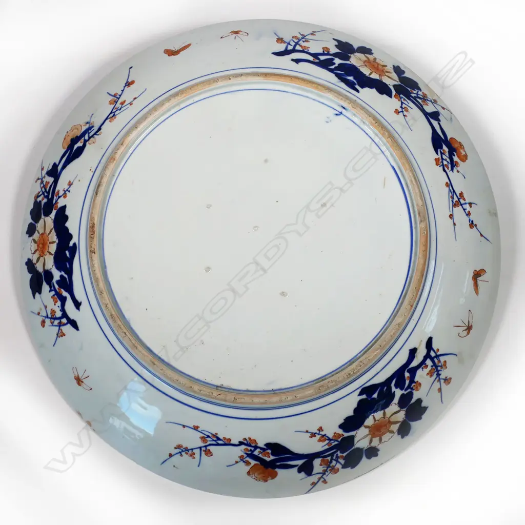 One of a matched pair, a massive Japanese Imari porcelain charger - see previous lot for additional details. Image 1++