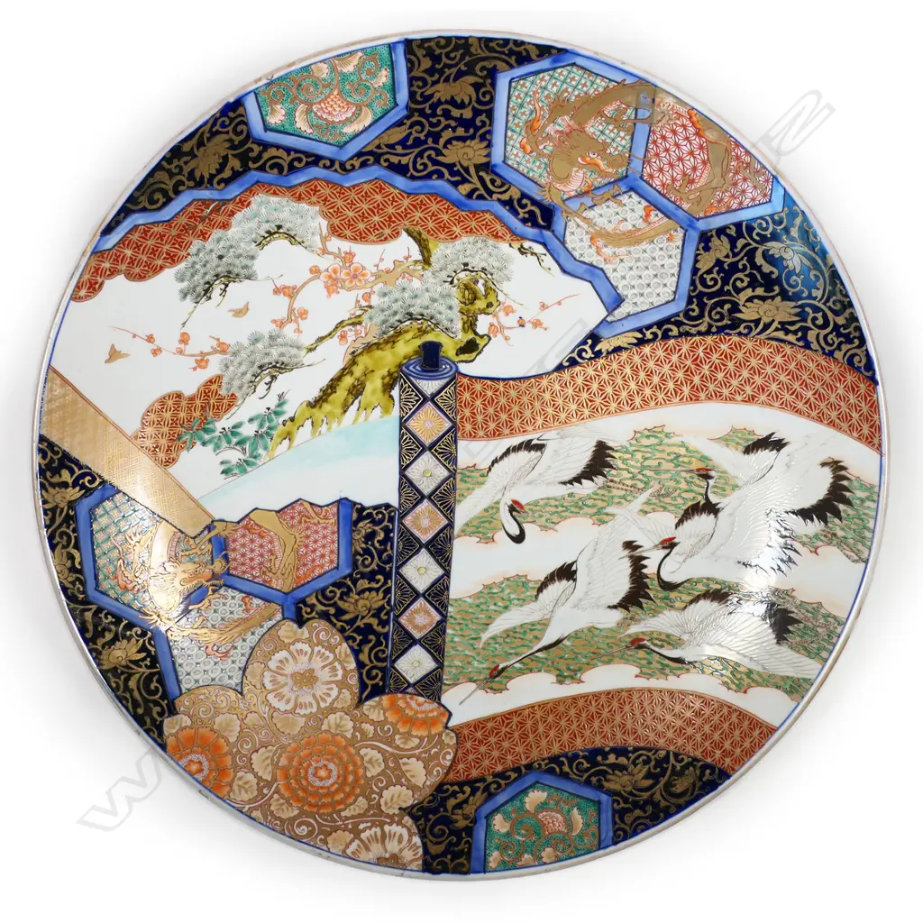 One of a matched pair, a massive Japanese Imari porcelain charger - see previous lot for additional details. Image 1++