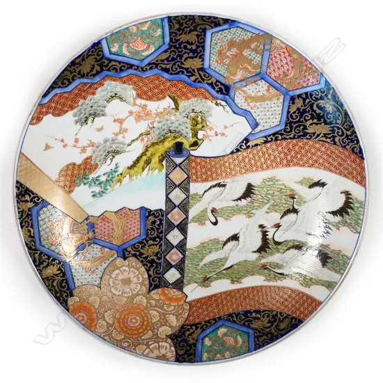 One of a matched pair, a massive Japanese Imari porcelain charger - see previous lot for additional details.