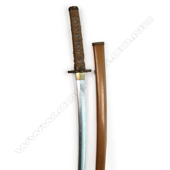 An uncommon small scale version of a Japanese katana, made for the Boy's Day ceremony - 455mm blade, the tang with two holes and threaded end; the hilt with correct scaled fittings and binding, in plain wood scabbard. Overall 630mm,