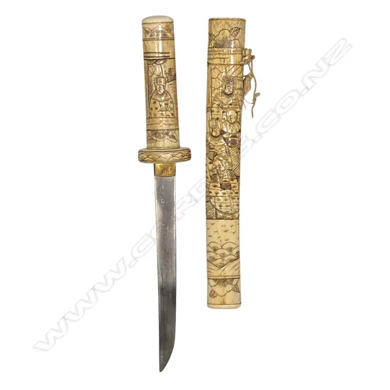 A Japanese tanto in bone scabbard and hilt - the sectional scabbard and conforming hilt, carved in low relief with numerous figures. Single edged blade. Overall L.405mm,
