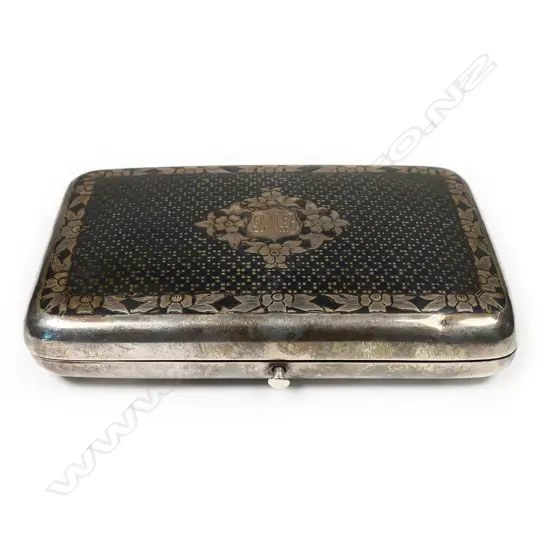 A 19thC Russian niello silver cigar case - finely decorated in a diaper pattern with floral border and framed cartouche. Push button release, the interior with marks for the maker Mikhail Foydorovich Sokolov and Moscow assay master's mark for Victor Vasilyevich Savinsky. 1867. W.120mm. 163gms.