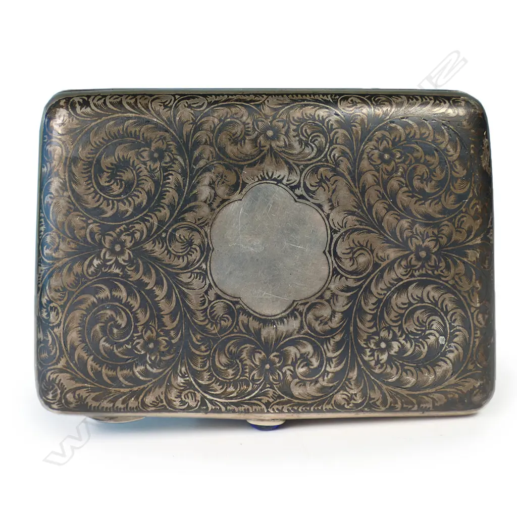 A 19thC Russian niello silver cigarette case - finely decorated with figures in horse drawn sliegh and leafy scrolls. Blue gem to the thumbpiece. Maker's mark for Pyotr Ambrosimov of Moscow 1869 - 1908. Image 1++