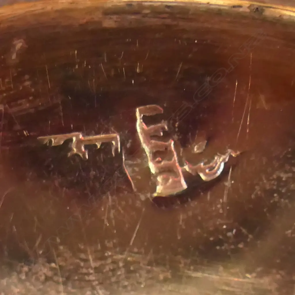 An 18thC Russian silver table box - the lid cast with a relief scene of two women in a treed landscape surrounded by cherubs. Fine engraved border bands. Stamped mark for 1786. Dia.90mm. 212gms. Image 1++