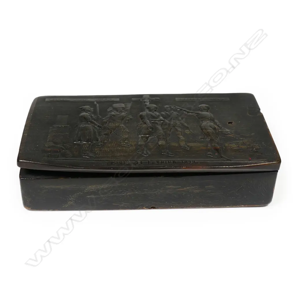 A 19thC French horn snuff box - the lid with fine a relief military scene entitled 'Beuple Viola Notre Maitre A Tous' and dated 'Paris 24 Fevrier 1848'. Minor faults. W.93mm. Image 1++