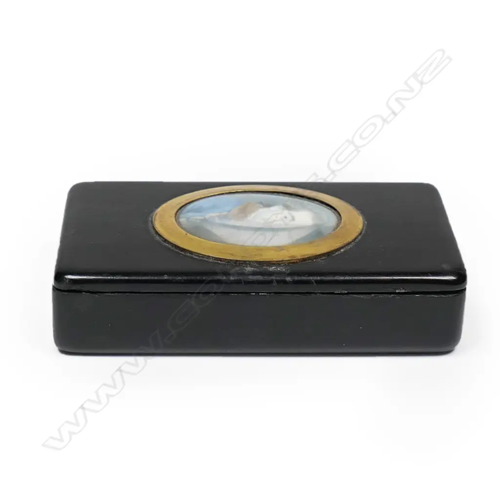 An 18thC European tortoiseshell snuff box set with a portrait miniature of a nobleman - the oblong box with loose lid (hinge absent) set with an oval gilt framed hand painted portrait under convex glass, of a gentleman in fur collared blue frock coat. Signed indistinctly right edge. 82 x 47 x 16mm, Image 1++