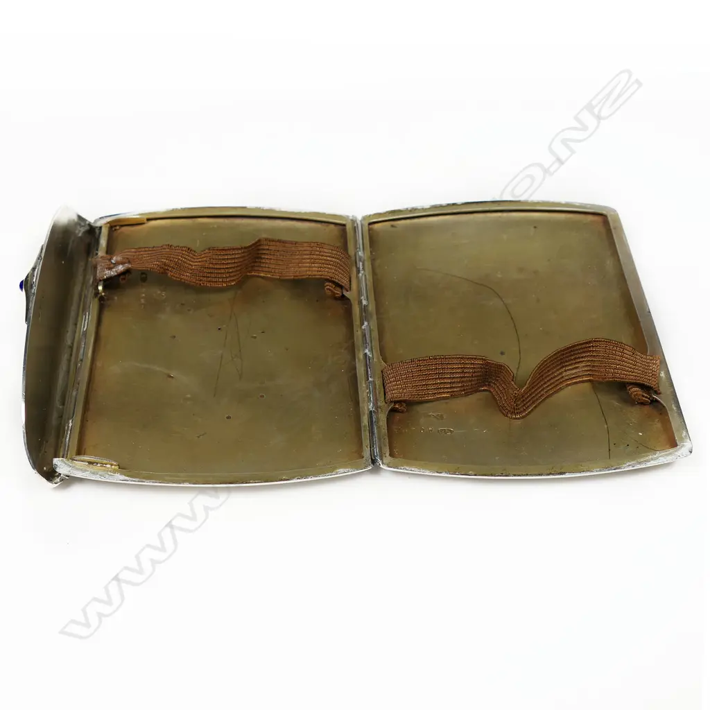 A c.1900 Russian silver folding hinged cigarette case - gold applied script initials and thumb piece set with blue stone. Impressed marks. 136gms. Image 1++