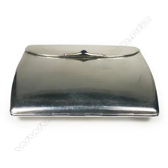 A c.1900 Russian silver folding hinged cigarette case - gold applied script initials and thumb piece set with blue stone. Impressed marks. 136gms.