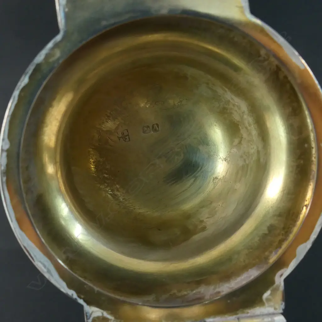 A silver and decorative fish themed cut glass wine ewer - with silver hinged lid, top mount with spout and handle. London 1876 by Jane Brownett & Alexander Jones. The ovoid body finely engraved with fish amongst reeds. On after market period brass steeped foot. H.340mm. Image 1++