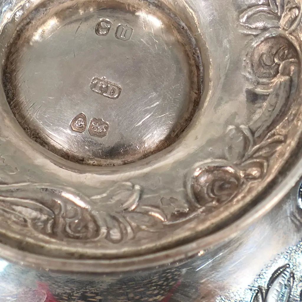 A William IV silver three-piece tea set, by Thomas Dick, London 1826 - compressed circular form raised on domed pedestal bases, chased and engraved with floral designs, the pot lid with floral finial. Total 1466gms. Image 1++