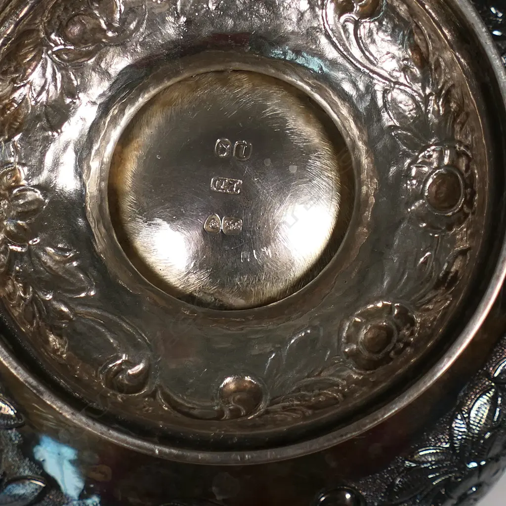 A William IV silver three-piece tea set, by Thomas Dick, London 1826 - compressed circular form raised on domed pedestal bases, chased and engraved with floral designs, the pot lid with floral finial. Total 1466gms. Image 1++