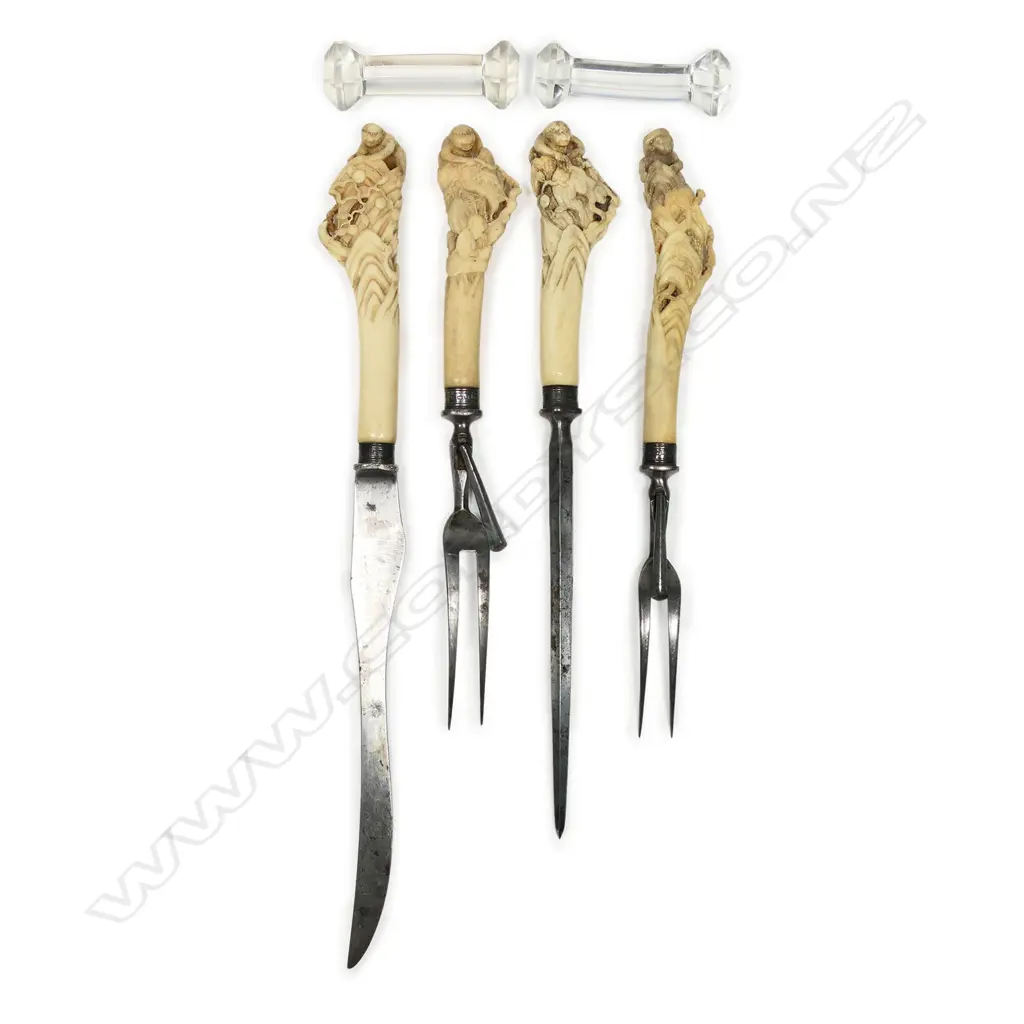 A Victorian silver mounted steel and Japanese carved bone handled carving set - the four pieces: knife, two forks and steel each with a carved bone handle featuring a monkey to the top and other animals and snake etc. One small loss. The collars Sheffield 1886 by William Yates a noted flatware and handle maker. Together with an old note about the set. Image 1++