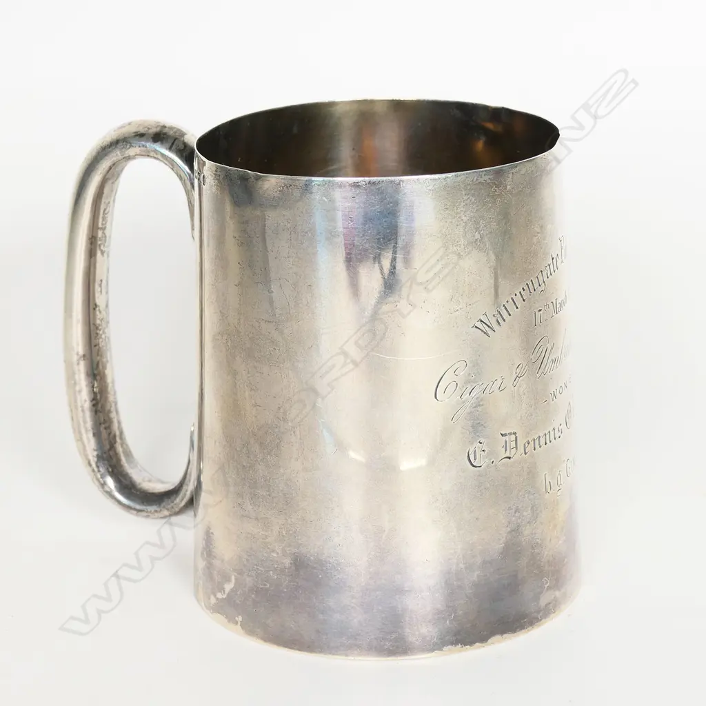 A 19thC New Zealand historical silver mug - presentation engraved 'Warrengate (Whanganui) Polo Sports 17th March 1894 Cigar & Umbrella Club Race Won by ...' Birmingham 1883 by W Spurrier & Co. H.105mm. 215gms. In original leather and gilded fitted case. Image 1++