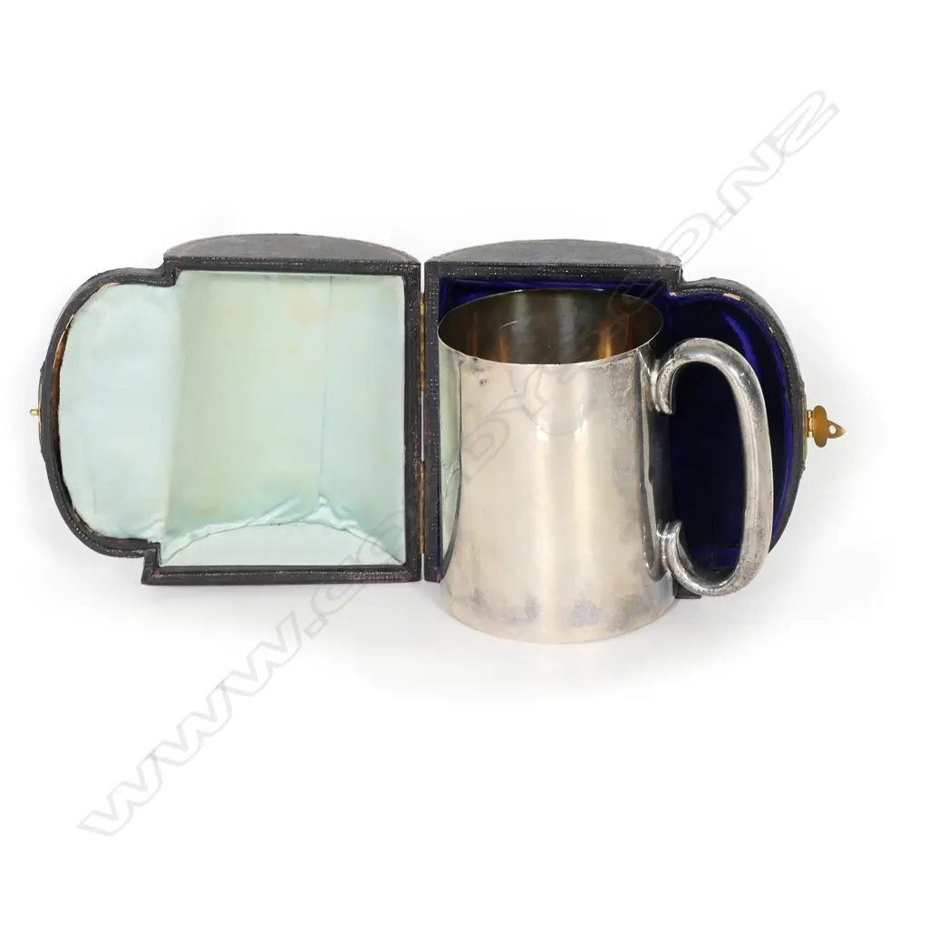 A 19thC New Zealand historical silver mug - presentation engraved 'Warrengate (Whanganui) Polo Sports 17th March 1894 Cigar & Umbrella Club Race Won by ...' Birmingham 1883 by W Spurrier & Co. H.105mm. 215gms. In original leather and gilded fitted case. Image 1++