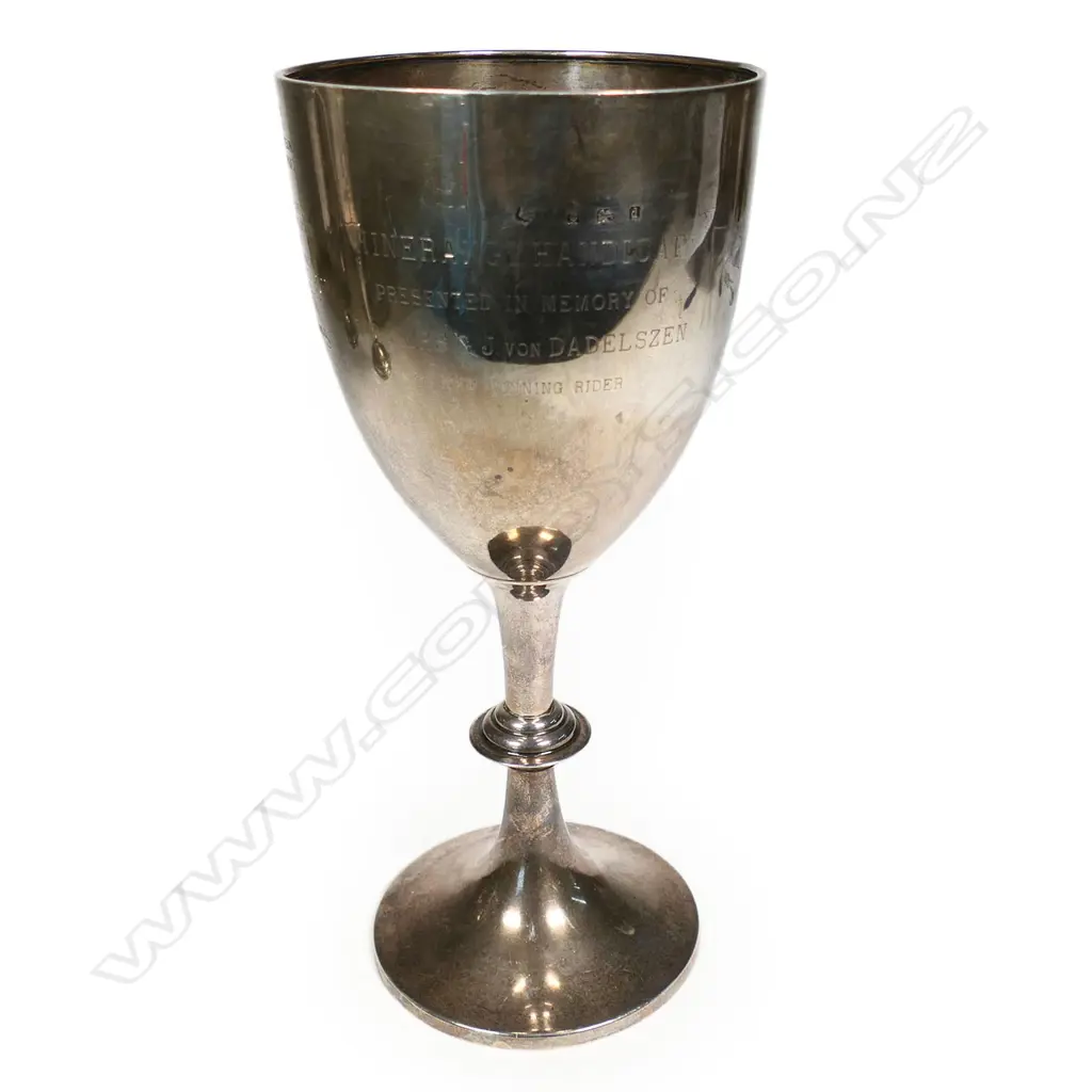 The New Zealand historic 'H.B. HUNT CLUB CUP 1905' - presentation engraved 'Won by E. S. Petits ‘MEPHISTO’, engraved with three jumping horses and riders. Birmingham 1903. H.270mm. 440gms. Image 1++