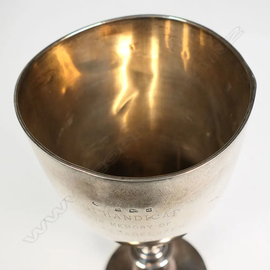 The New Zealand historic 'H.B. HUNT CLUB CUP 1905' - presentation engraved 'Won by E. S. Petits ‘MEPHISTO’, engraved with three jumping horses and riders. Birmingham 1903. H.270mm. 440gms. Image 1++