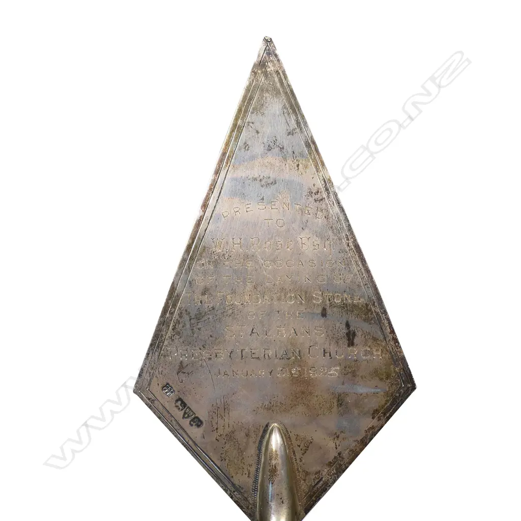 A cased presentation silver foundation laying trowel - engraved 'Presented to W.H. Ross Esq. On The Occasion Of Laying The Foundation Stone Of The St. Albans Presbyterian Church January 31st 1925’. Ivory handle. L.250mm. 96gms. In original leather fitted case. Image 1++