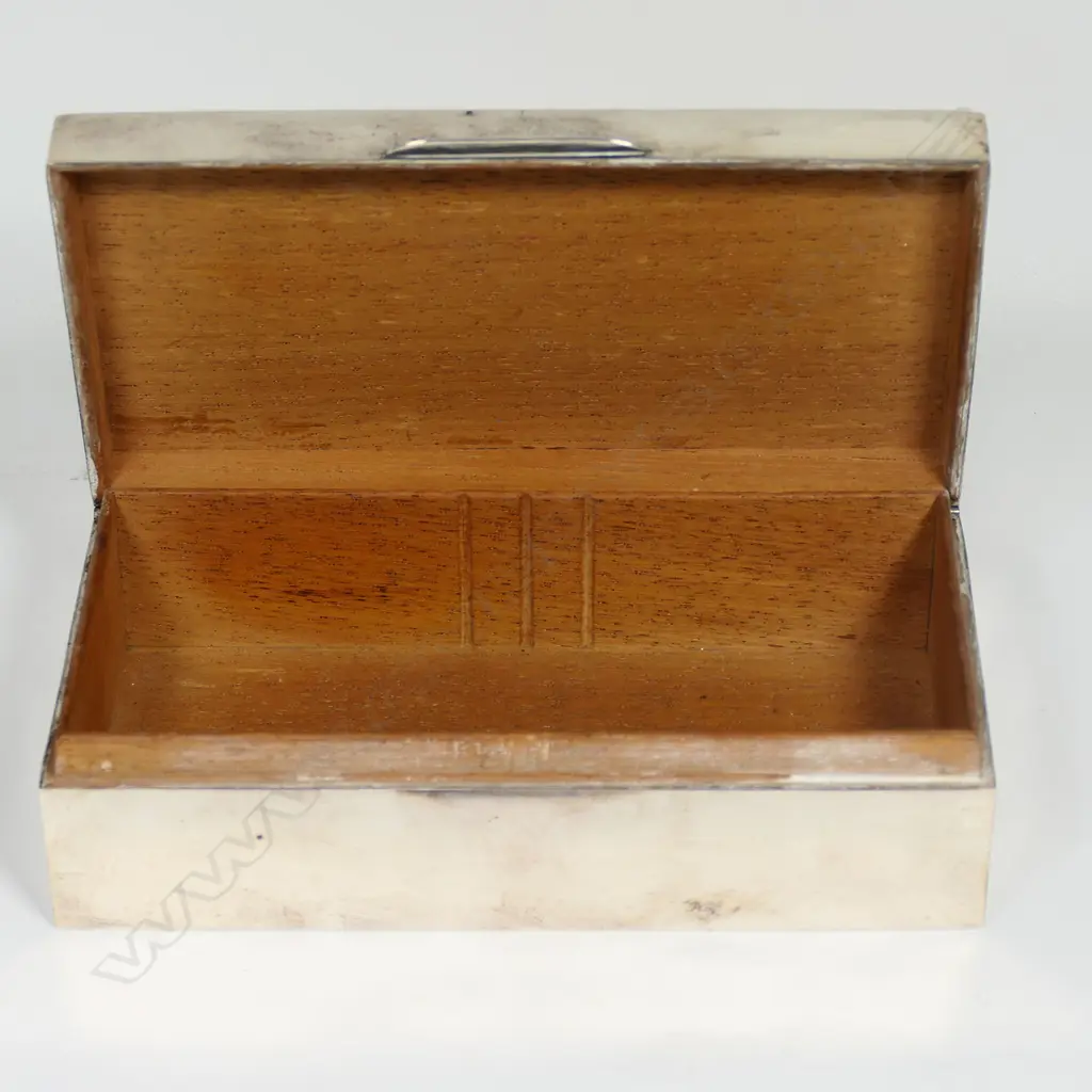 A 'New Zealand And South Seas International Exhibition' silver presentation box - the lid engraved as above and 'Presented to Mrs Sutherland Ross by the Women's Executive As A Token Of Their Appreciation And Regard. 23-11-25'. Birmingham 1923 L.180mm. 509gms total. Image 1++