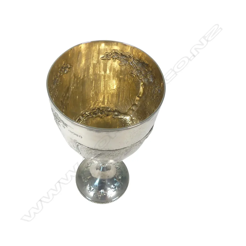 The New Zealand historic 'A.A. & P.A. 1881' silver trophy cup for Best Cow, presentation engraved, awarded to John Grey Esq. and presented by 'Messrs. Wilson & Horton'. Engraved and embossed with a cow. London 1879 by Richards & Brown (Edward Charles Brown). H.195mm. 208gms. Image 1++