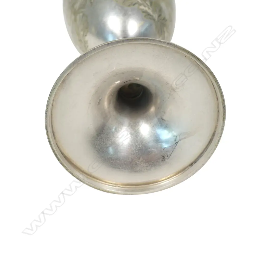 A late 19thC New Zealand historical silver plate trophy cup, presentation engraved ' Dunedin Bowling Club Rink Match 1887 Won By James Anderson. The front engraved with a bowling scene. The plating worn. H.210mm. Image 1++