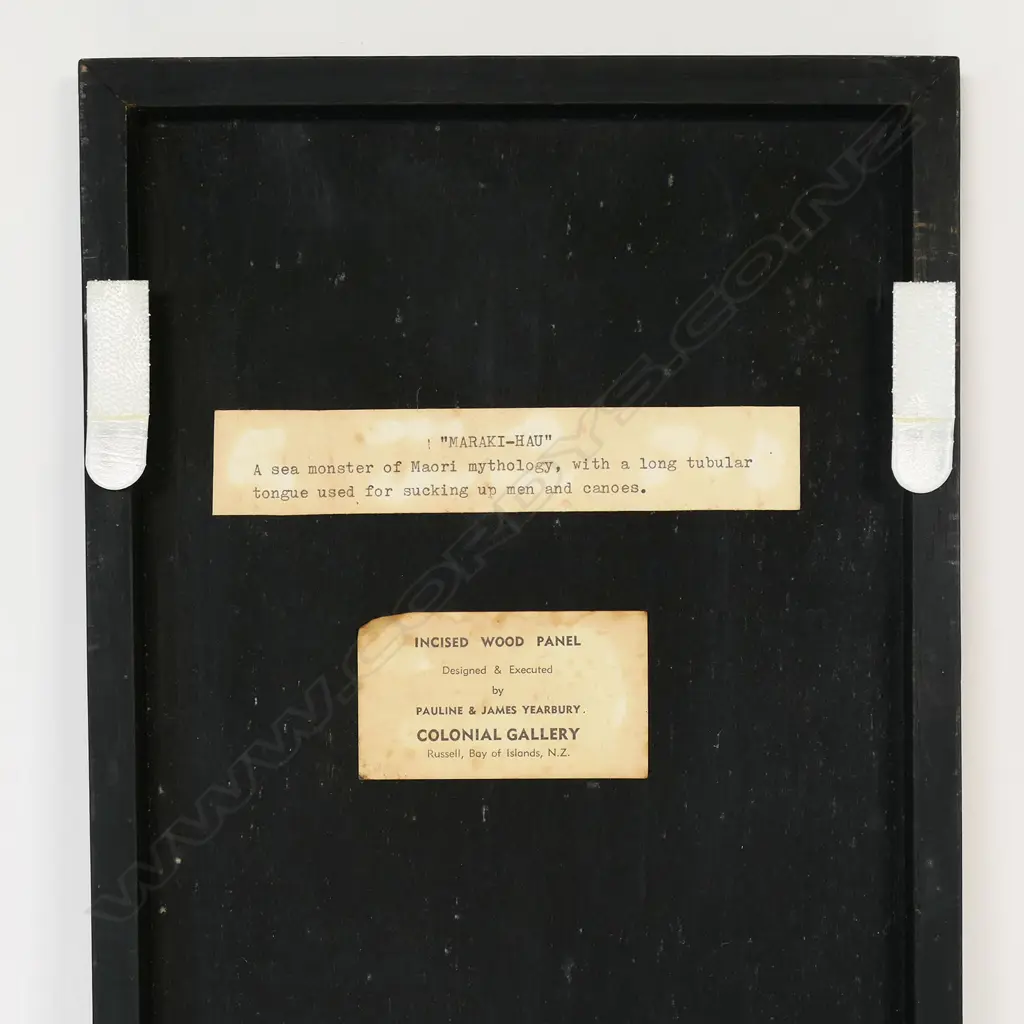 Pauline Yearbury (Ngāpuhi 1926–1977) and James Yearbury (1921-2008) 'MARAKI-HAU' - incised and coloured wood panel, signed with incised cipher lower left. Labelled and entitled verso 'A Sea Monster of Māori mythology, with a long tubular tongue used for sucking up men and canoes'. Another label detailed 'Designed and Executed by Pauline and James Yearbury, Colonial Gallery, Russell, Bay of Islands, N.Z'. 405 x 165mm, Image 1++