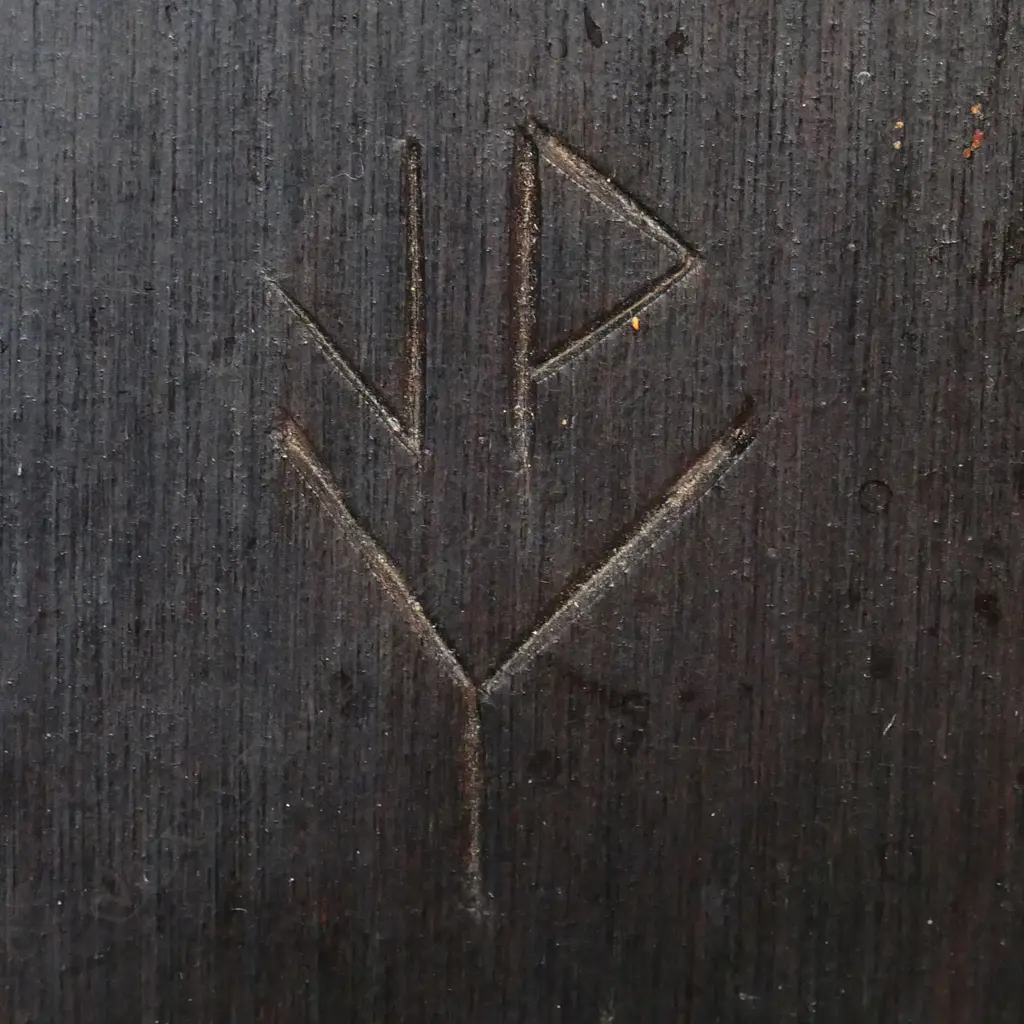 Pauline Yearbury (Ngāpuhi 1926–1977) and James Yearbury (1921-2008) 'MARAKI-HAU' - incised and coloured wood panel, signed with incised cipher lower left. Labelled and entitled verso 'A Sea Monster of Māori mythology, with a long tubular tongue used for sucking up men and canoes'. Another label detailed 'Designed and Executed by Pauline and James Yearbury, Colonial Gallery, Russell, Bay of Islands, N.Z'. 405 x 165mm, Image 1++