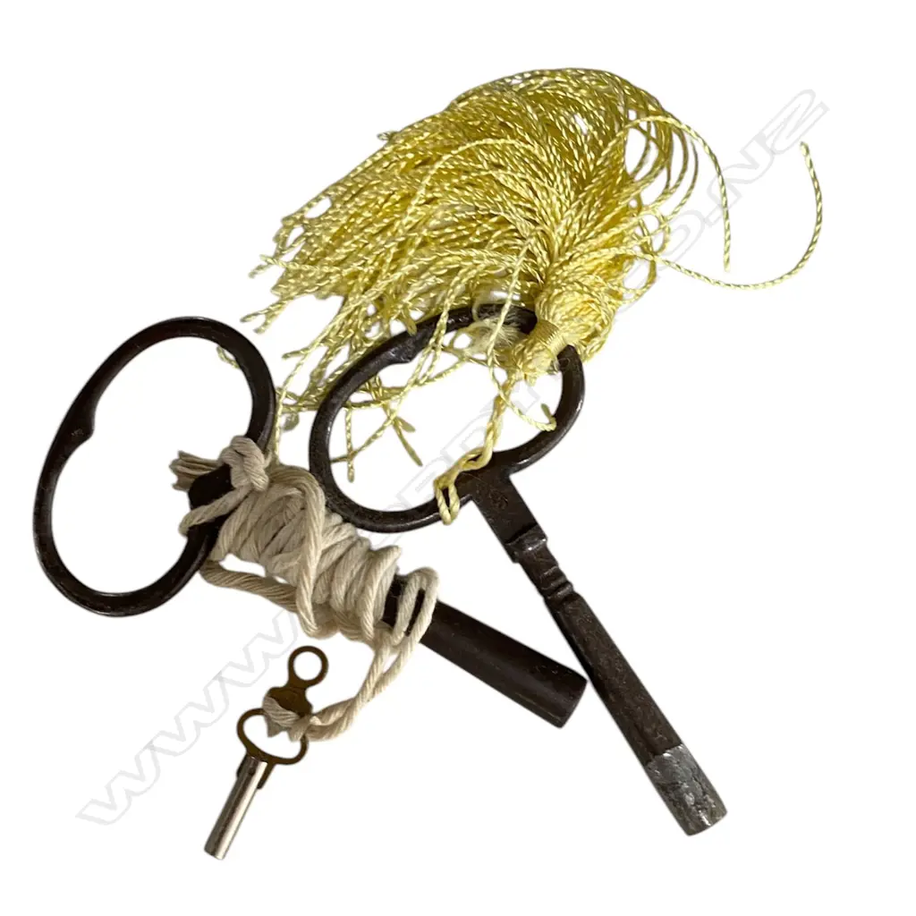 A Victorian black slate mantel clock - platform and scrolled base, the white enamel dial with Roman numerals and open ascapment. W.560mm. Image 1++