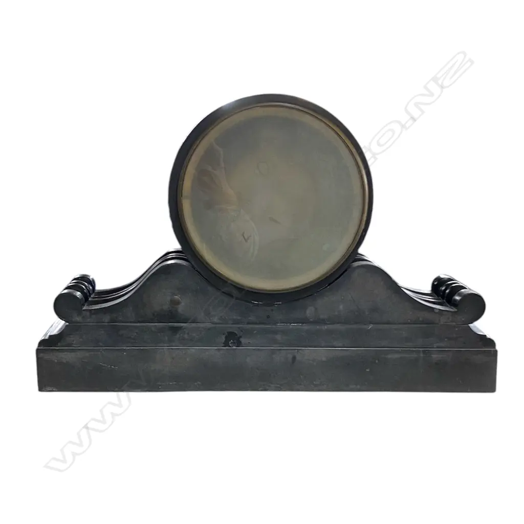 A Victorian black slate mantel clock - platform and scrolled base, the white enamel dial with Roman numerals and open ascapment. W.560mm. Image 1++