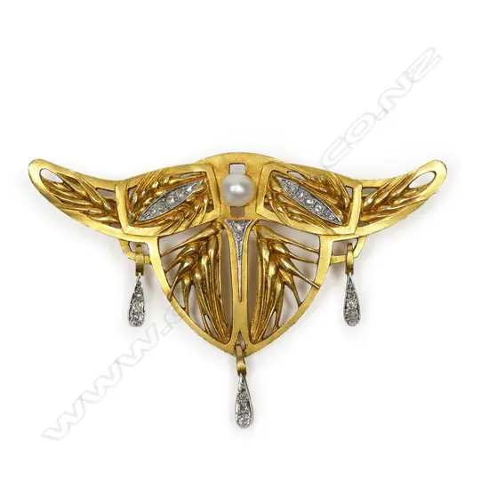 A rare 'Gonon' French Art Nouveau 18ct yellow gold diamond and pearl stylish brooch - of winged form with wheat sheath open decoration highlighted with 21 rose cut diamonds, set in white gold, including nine to the three pendant drops, and a single cultured pearl. The reverse stamped 'GONON PARIS 1912'. W.74mm. 19.2gms.