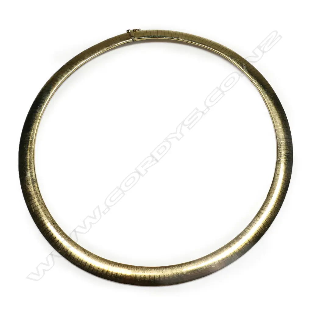 A 9ct gold choker - graduating flat articulated links, push clasp with safety catch. 46.73gms. Valuation available. Image 1++