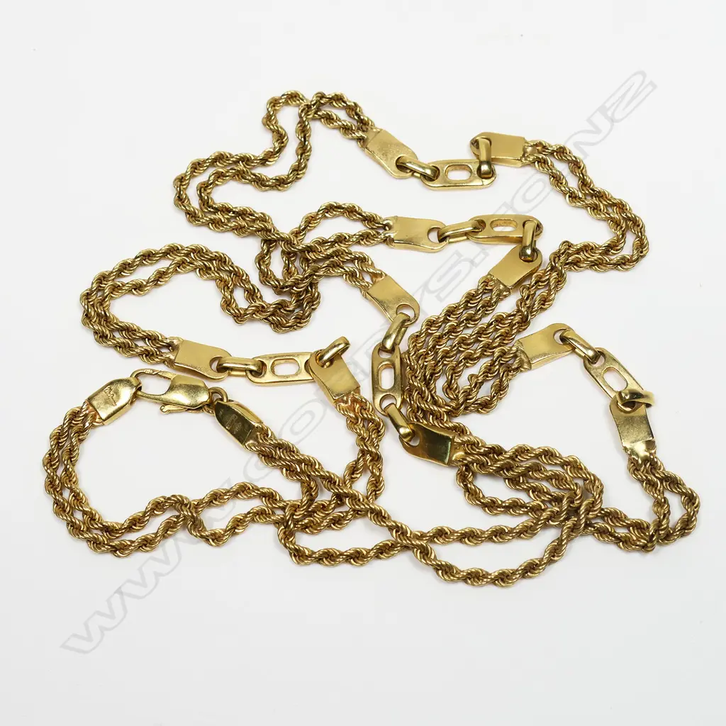 An 18ct gold chain - a double rope twist chain with five 'horse bit' style links. 63.23gms. L.740mm. 63.23gms. Valuation available. Image 1++
