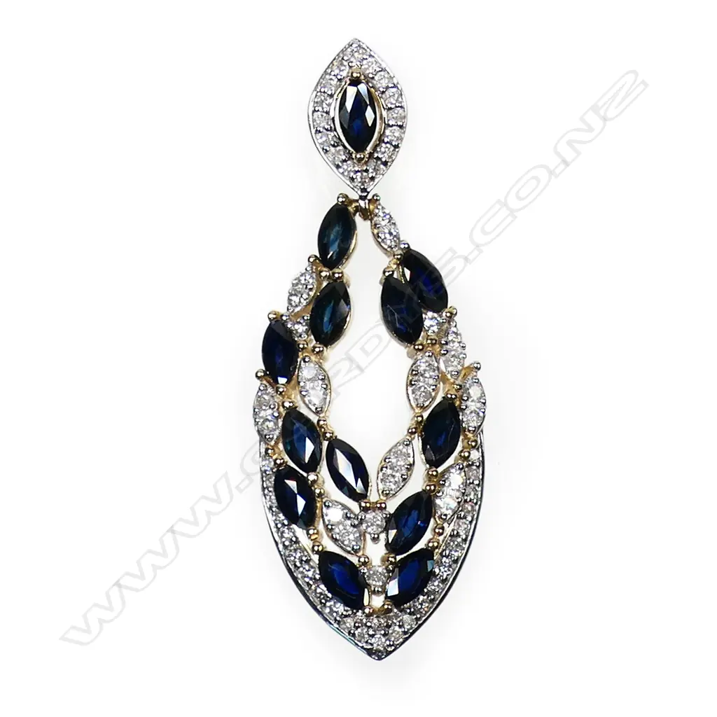 A 14ct gold sapphire and diamond drop pendant - thirteen marquise cut royal blue sapphires (minor eye visible inclusions), claw set and embellished with sixty-six round brilliant cut diamonds (Colour J-K, Clarity SI2-I2), bead set in white gold. TSW. 2.00ct. TDW. 0.52ct. Image 1++