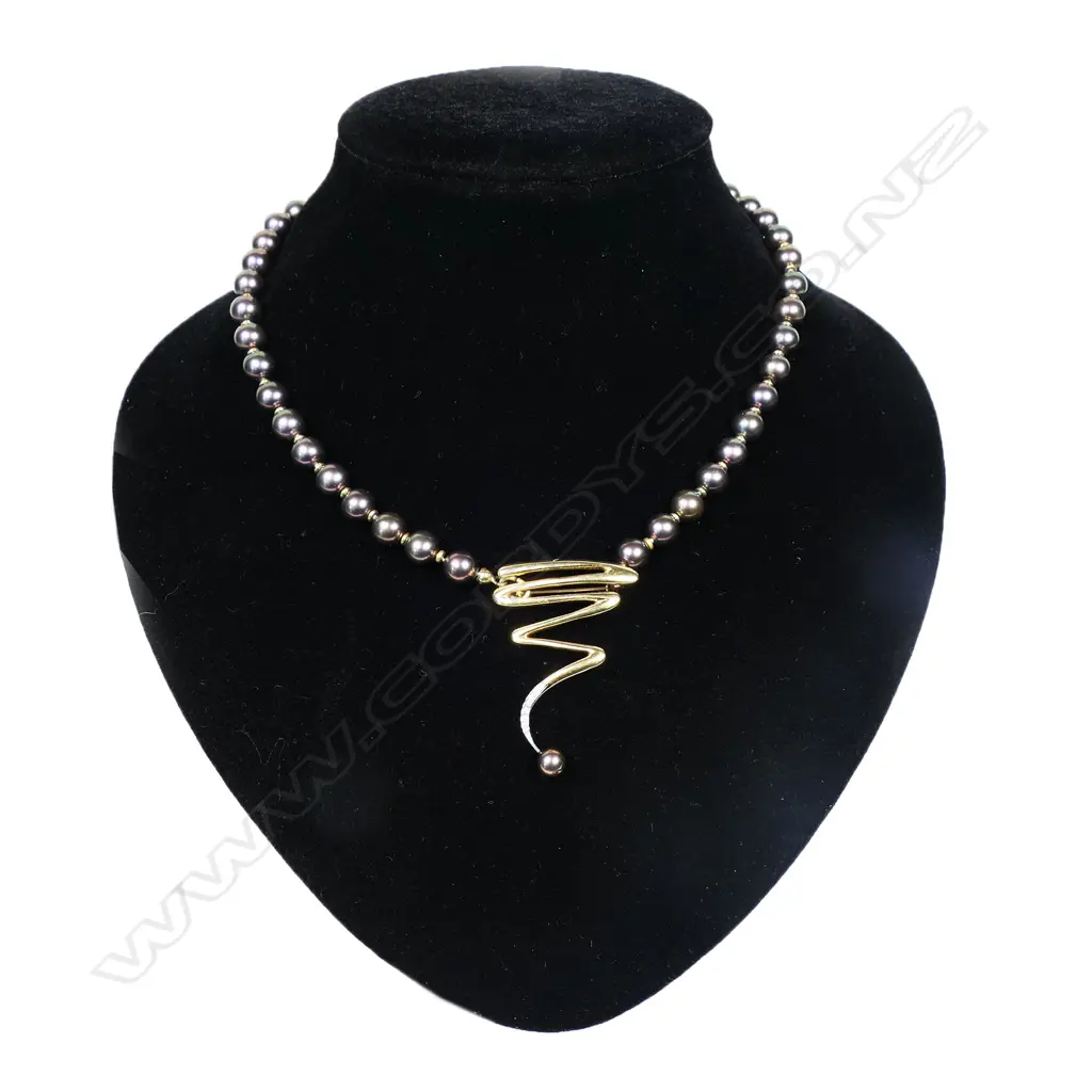 Tahitian pearl 14ct gold and diamond necklace - of 48 round Tahitian pearls of purple grey tone and diameter 5.7mm to 7.4mm with a central 14ct yellow gold detachable pendant brooch set with eight round brilliant cut diamonds. 21 'gold' spacers between the pearls. 18ct gold clasp. L.400mm. Valuation available. Image 1++