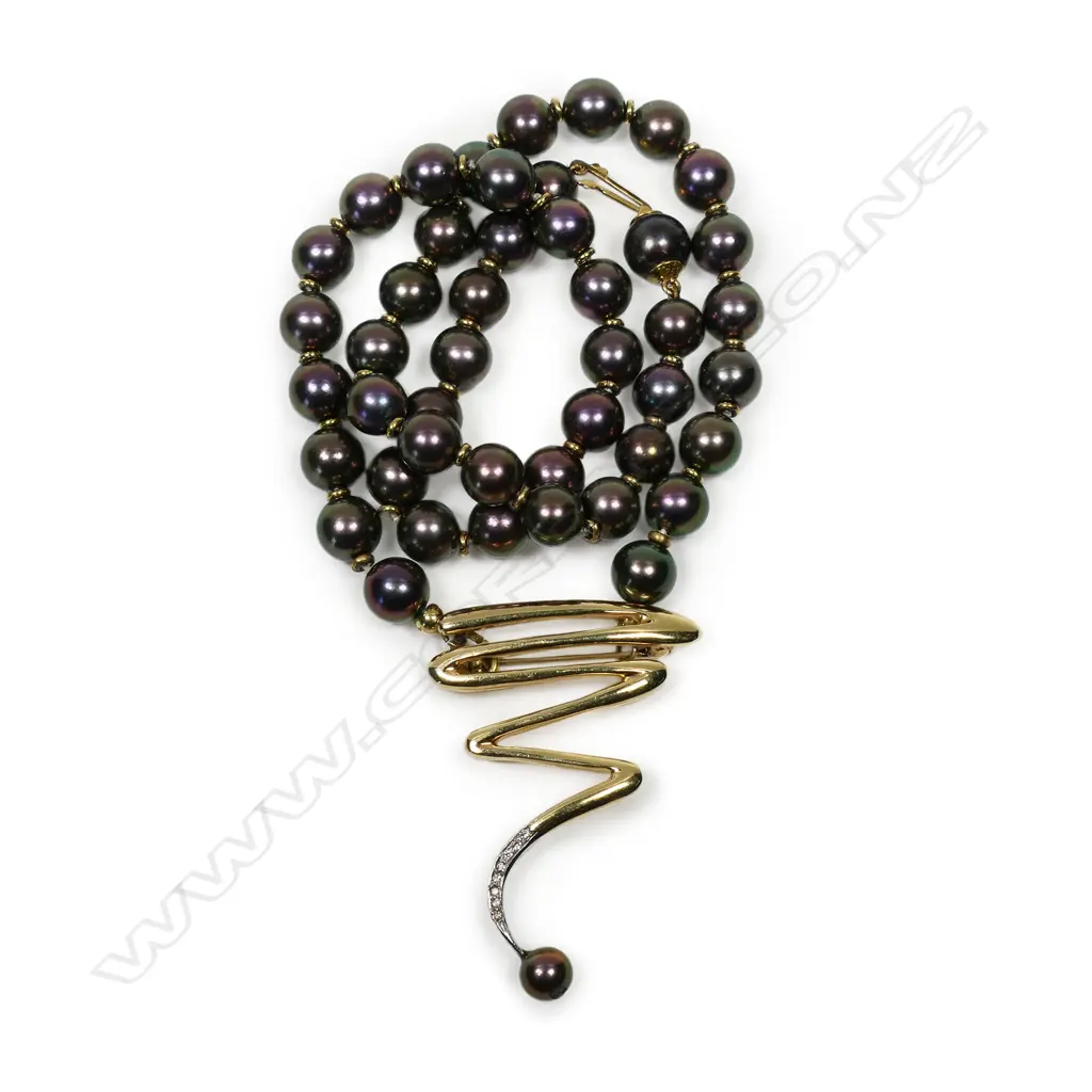 Tahitian pearl 14ct gold and diamond necklace - of 48 round Tahitian pearls of purple grey tone and diameter 5.7mm to 7.4mm with a central 14ct yellow gold detachable pendant brooch set with eight round brilliant cut diamonds. 21 'gold' spacers between the pearls. 18ct gold clasp. L.400mm. Valuation available. Image 1++