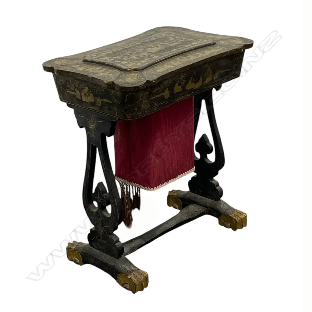 A Victorian paper machè chinoiserie sewing table - the interior with various compartments and with original ivory and bone accessories, pull out fabric well, lyre shaped supports and stretcher base. 530 x 380 x 640mm. Image 1++