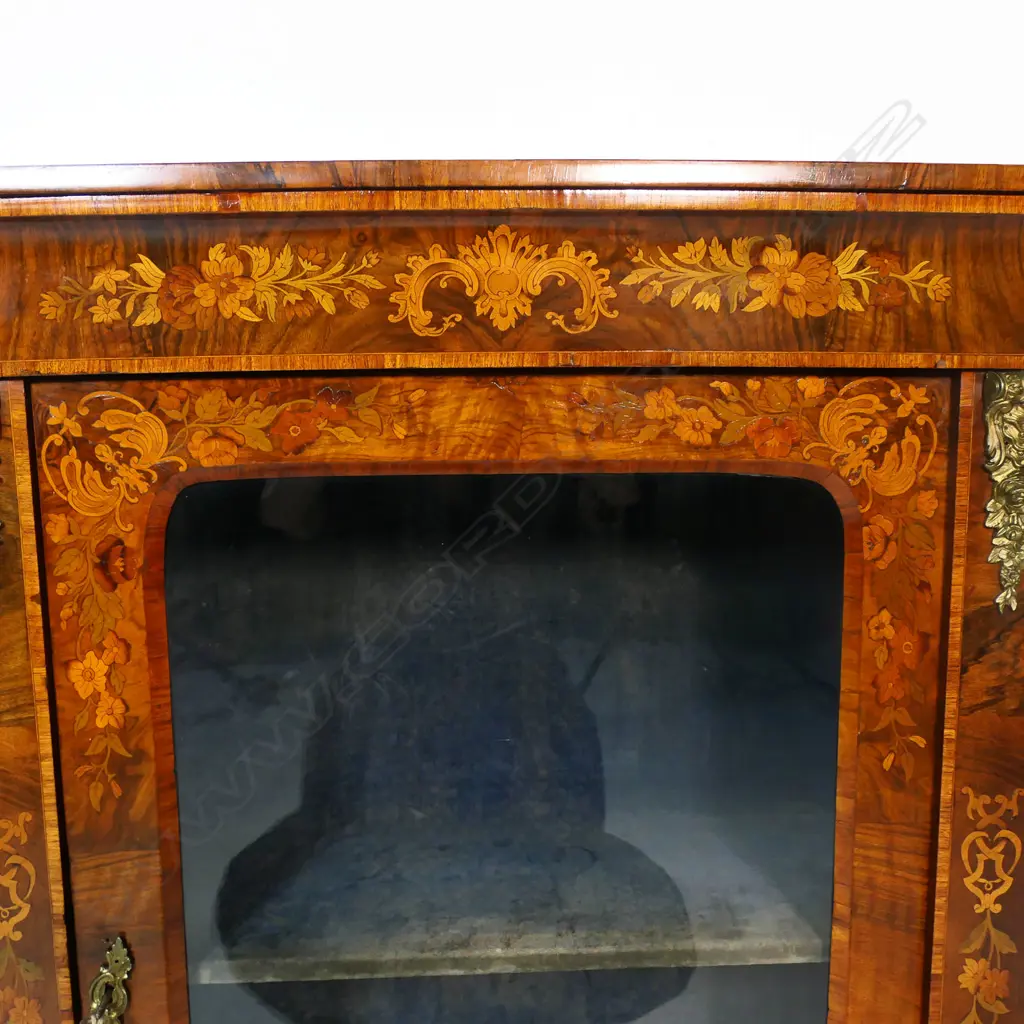 A 19thC walnut pier cabinet. Image 1++
