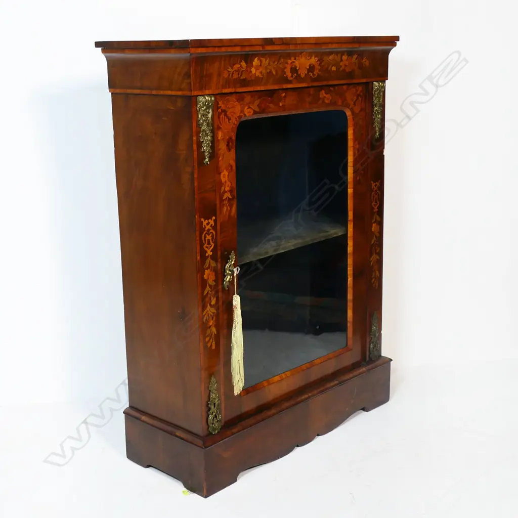 A 19thC walnut pier cabinet. Image 1++